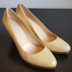 Nude patent leather Cole Haan pumps